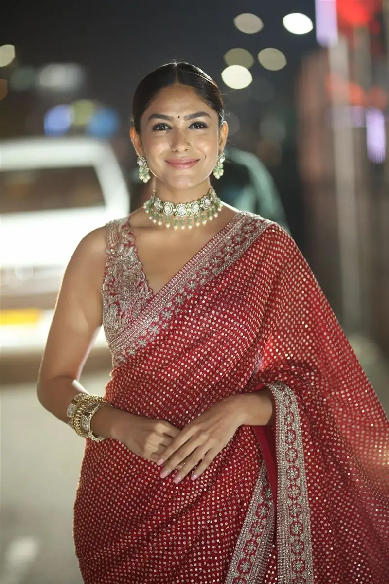 mrunal thakur wearing beautiful earrings jewellery red saree